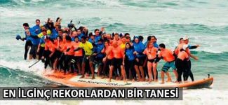 Bir sörfe 66 kişi binerek Guinness rekoru kırdılar