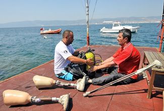 Engelleri su altı dünyası ile aştı