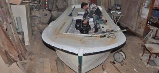 Hayali olan tekneyi kendi imal etti