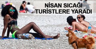 Antalya'da nisan sıcağı turistlere yaradı