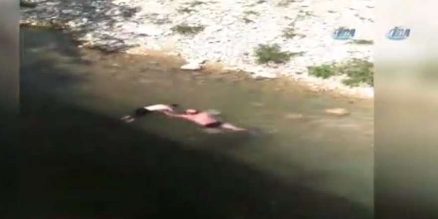 Nehirde boğulmak üzere olan çocuğu muhabir kurtardı